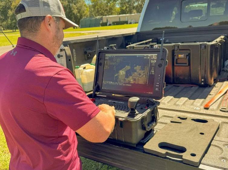 Brain Sumner controlling a photogrammetry drones